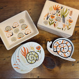 Ensemble de 4 sous-verres parmi d'autres articles de la collection A Small World