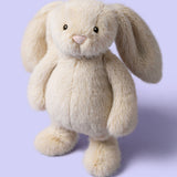 Jellycat - Petit Lapinot Blé Wheat Flufflet Bunny Little BASS6TLB - À Angle Sur Fond Lavande