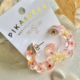 Pike_Bear-Boucle d'oreilles Maypole en Acetate avec fleurs seche rose packaging